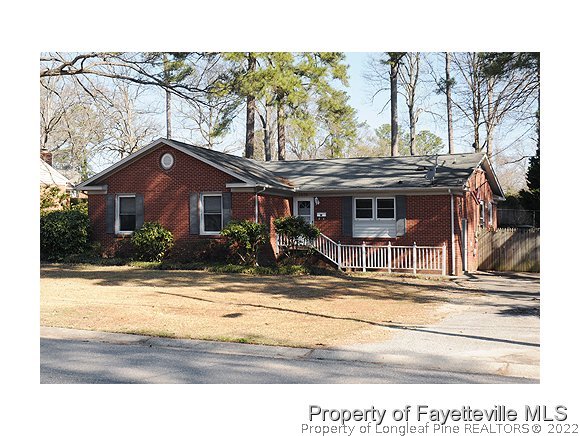 3636 Drayton Road Fayetteville, NC 28303 - Photo 1 of 25 a view of a house with a small yard and plants