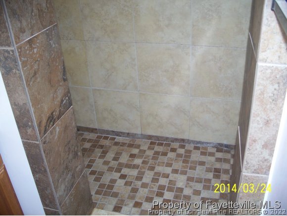 3636 Drayton Road Fayetteville, NC 28303 - Photo 17 of 25 a bathroom with a shower