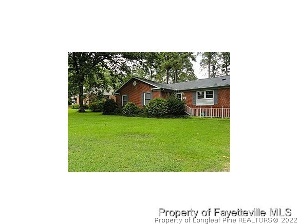 3636 Drayton Road Fayetteville, NC 28303 - Photo 25 of 25 a picture of a person on a field
