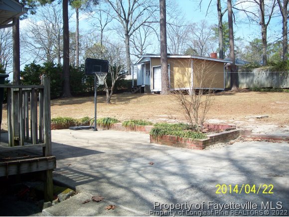 3636 Drayton Road Fayetteville, NC 28303 - Photo 3 of 25 a view of a house with a yard