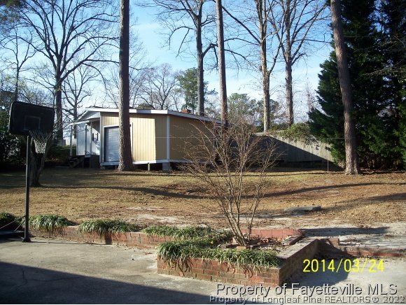 3636 Drayton Road Fayetteville, NC 28303 - Photo 5 of 25 a view of a house with a yard