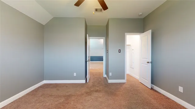 a house view with a swimming pool and sitting space