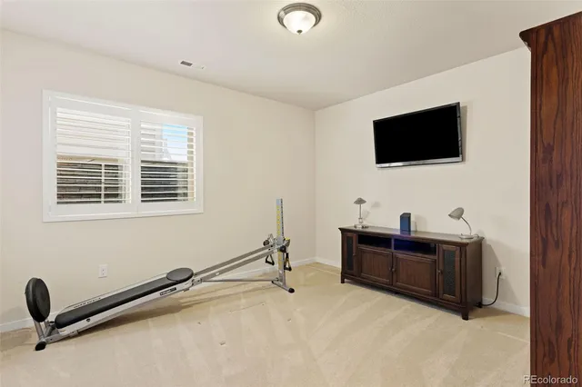 a view of a livingroom with furniture