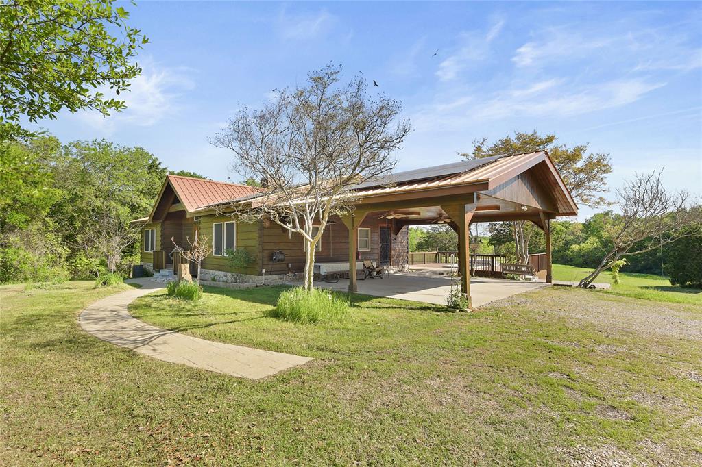 821 Ewing Road Ferris, TX 75125 - Photo 3 of 40 a view of back yard of the house