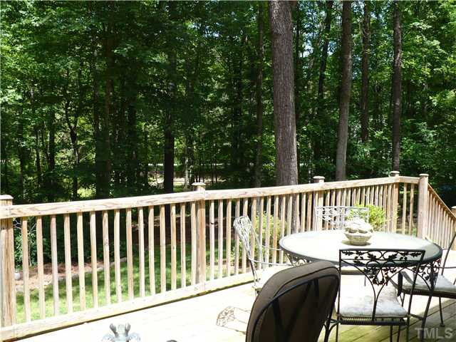 8633 Langtree Lane Raleigh, NC 27613 - Photo 11 of 12 a view of a chair and table in the balcony