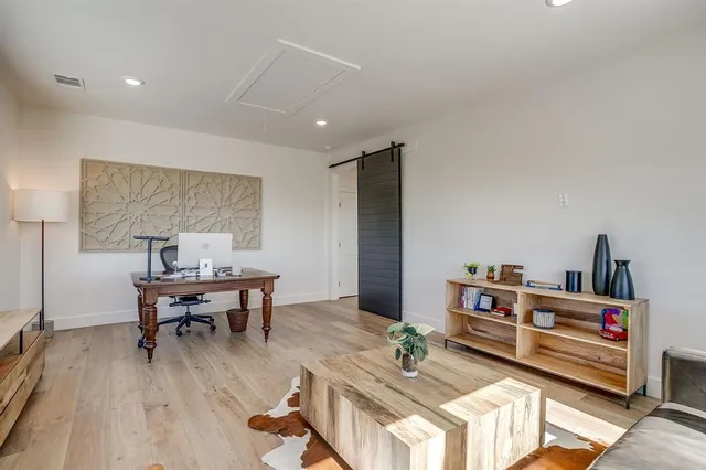 a bathroom with a double vanity sink and mirror