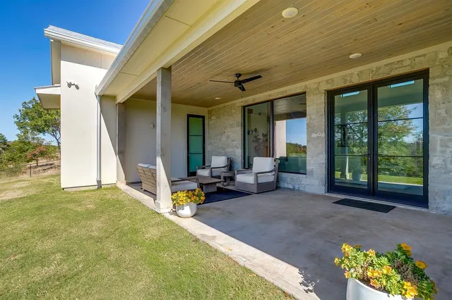a view of swimming pool with a yard