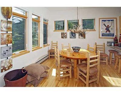 1180 North Frontage Road West, Unit 6A Vail, CO 81657 - Photo 3 of 12 a view of a dining room with furniture window and outside view
