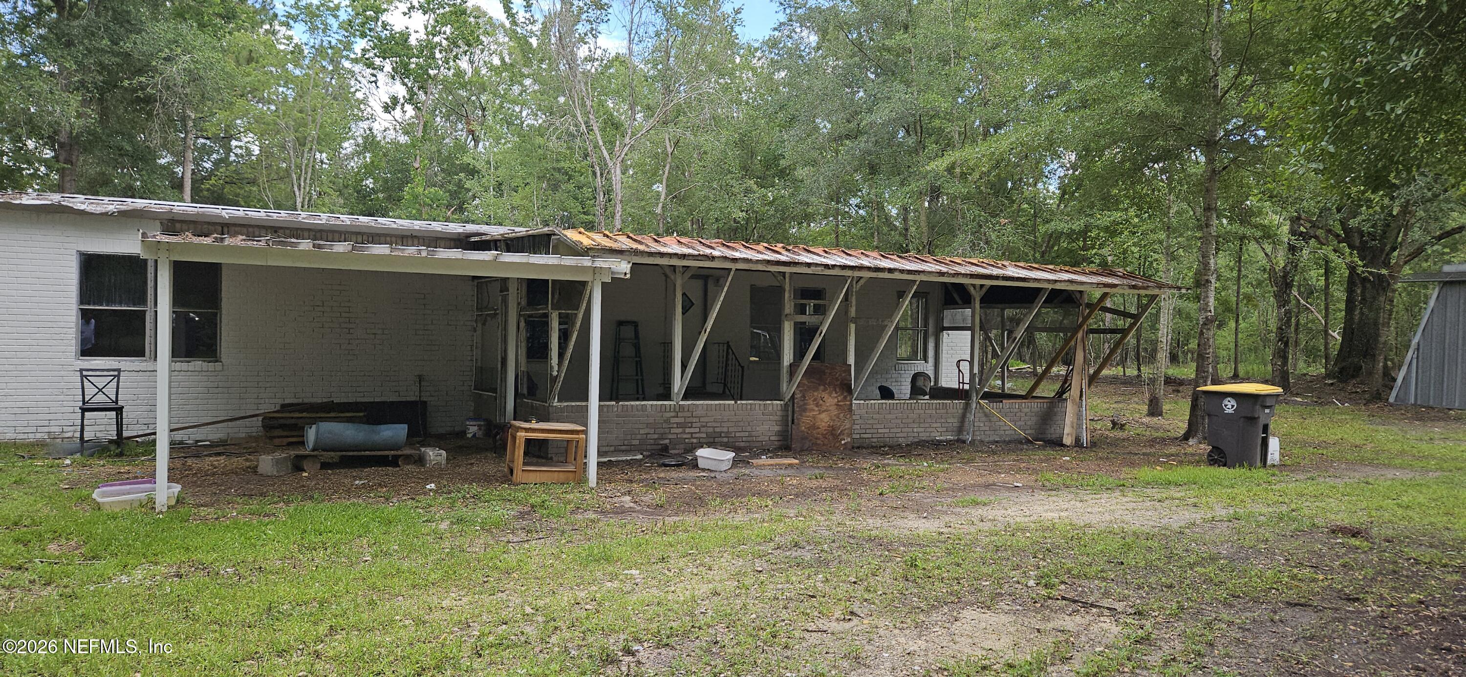 5363 Kilcrease Road Jacksonville, FL 32234 - Photo 2 of 29 a view of a house with a yard and sitting area