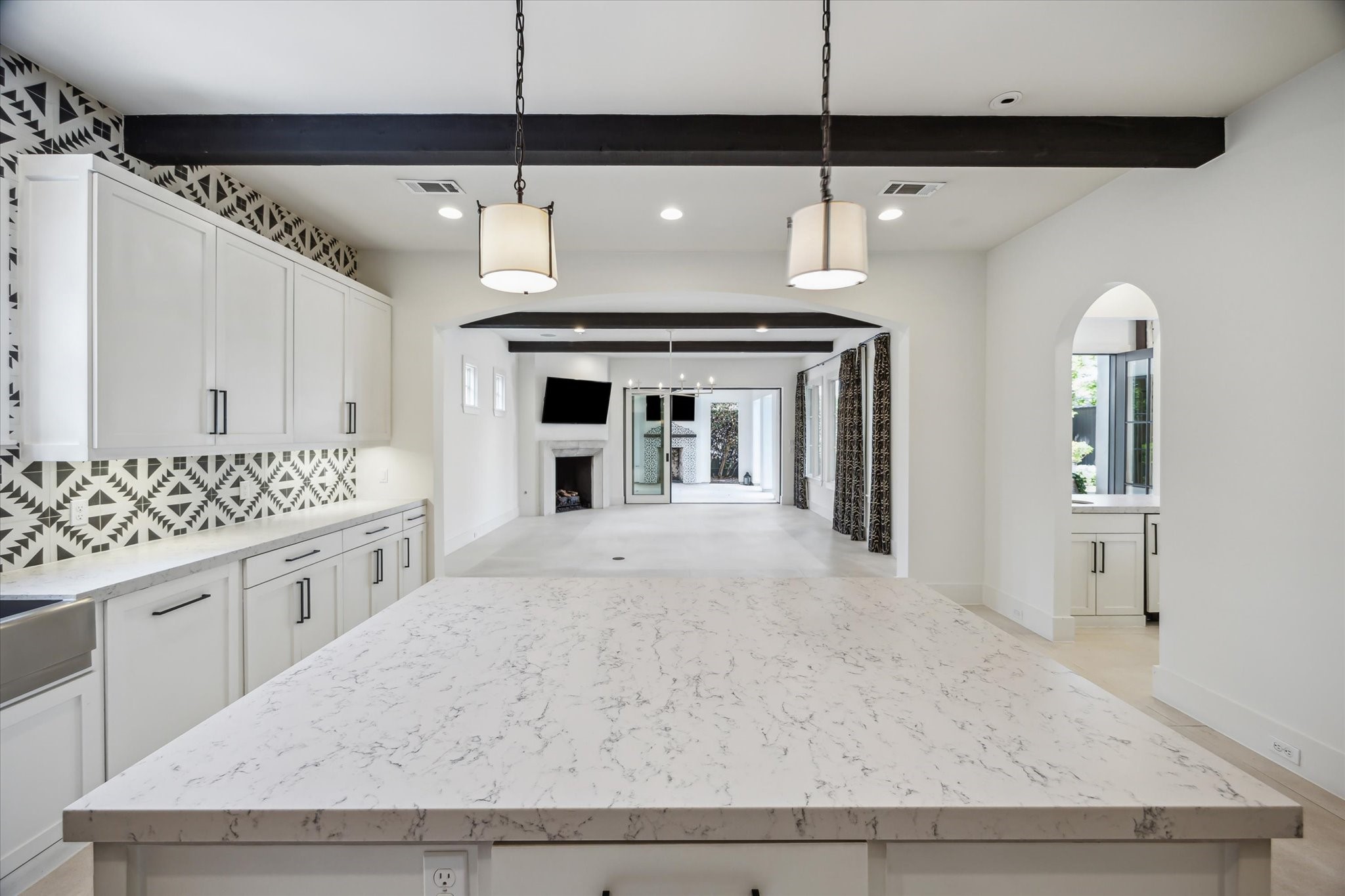3214 Westheimer Road Houston, TX 77098 - Photo 17 of 39 Open to the kitchen, the breakfast room offers a welcoming area for family and friends. Its thoughtful design ensures it’s both stylish and practical for everyday living.