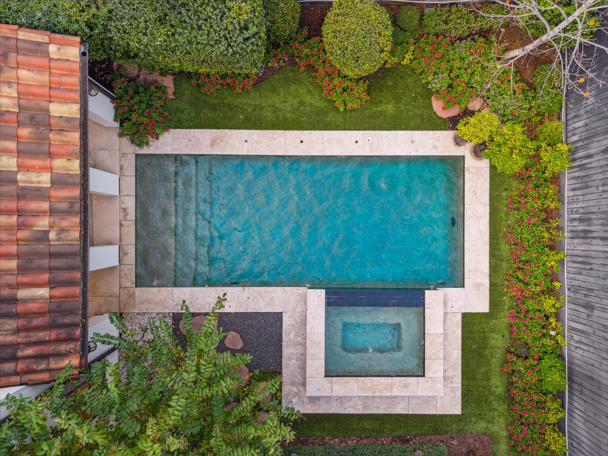 3214 Westheimer Road Houston, TX 77098 - Photo 38 of 39 Around the corner, a side yard oasis includes a rejuvenating cold plunge and a private sauna, offering a spa-like experience at home. This thoughtfully designed space ensures relaxation and wellness are always within reach.