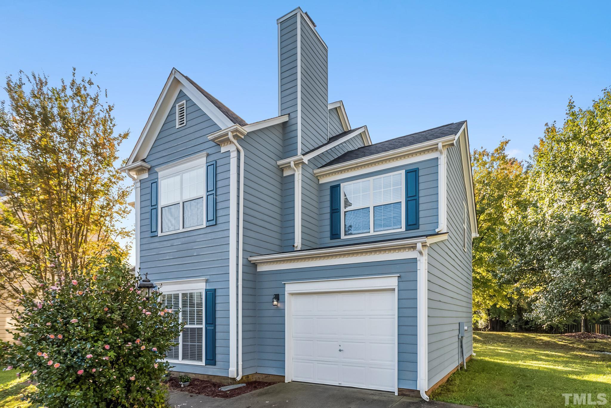 121 Marleton Way Holly Springs, NC 27540 - Photo 2 of 26 front view of a house with a yard