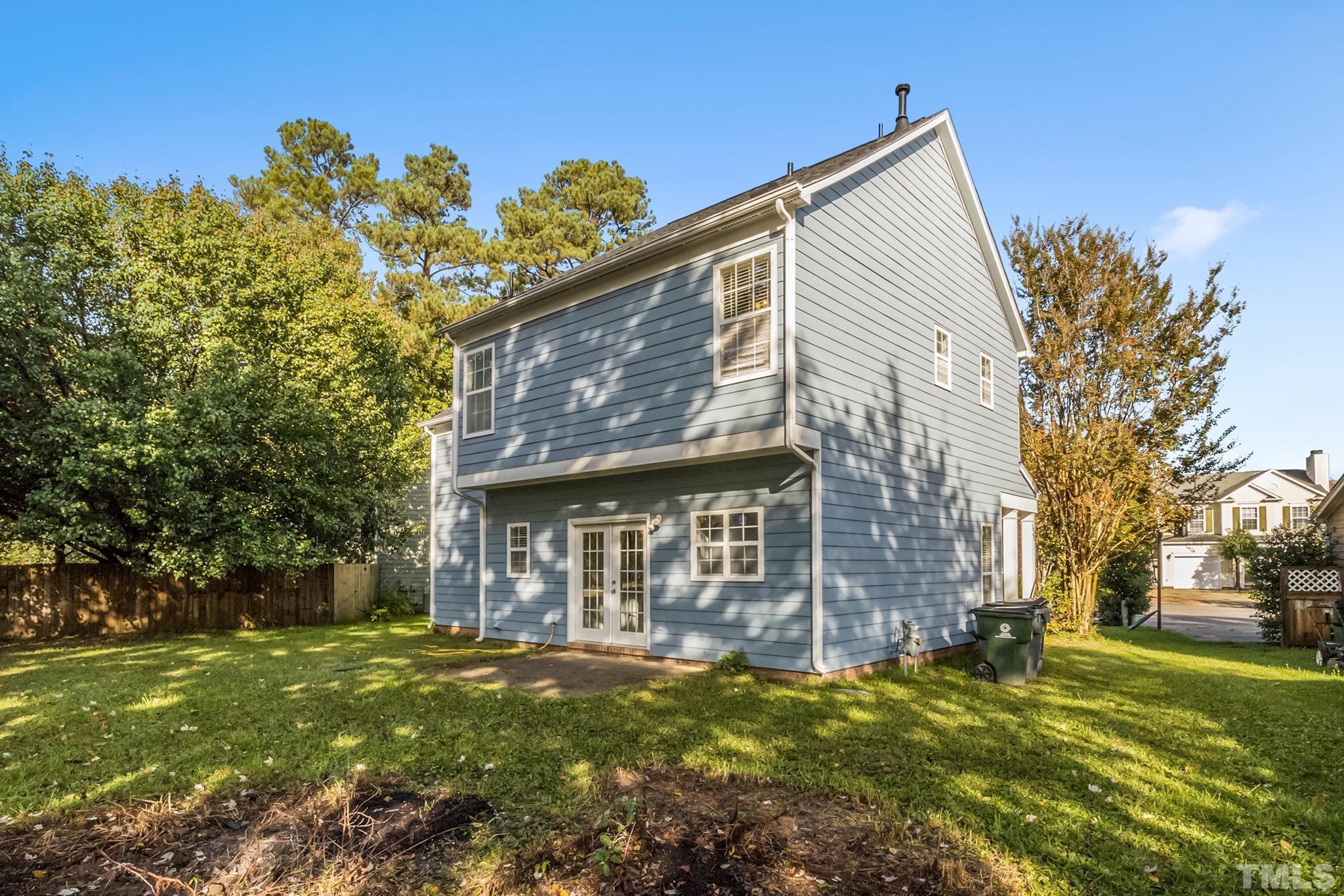 121 Marleton Way Holly Springs, NC 27540 - Photo 4 of 26 a front view of a house with a garden