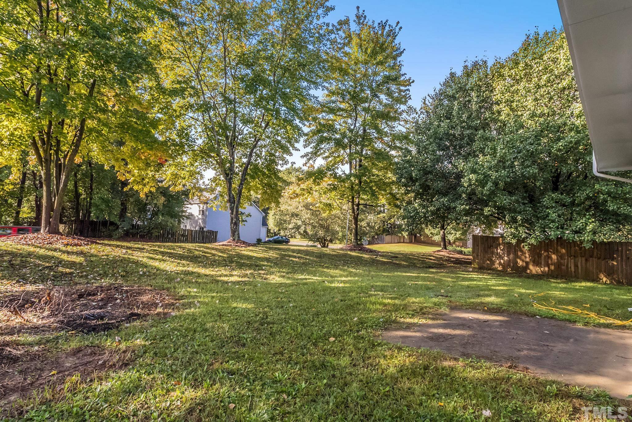 121 Marleton Way Holly Springs, NC 27540 - Photo 6 of 26 a fire hydrant in the middle of a field