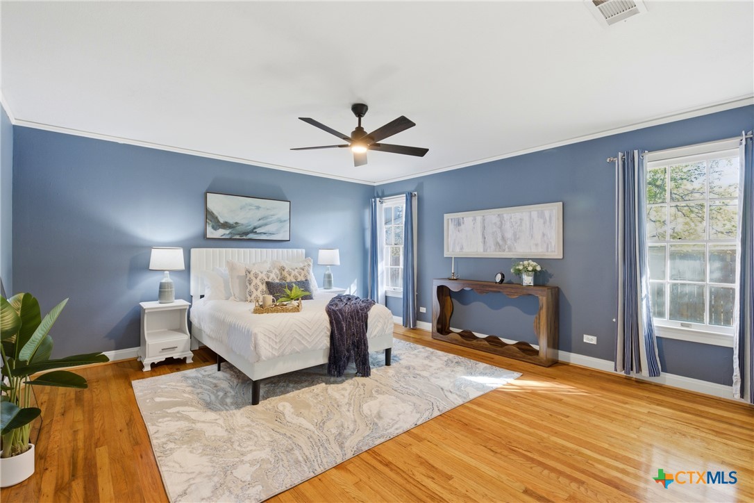 1506 Grace Street Taylor, TX 76574 - Photo 5 of 22 a living room with furniture and wooden floor