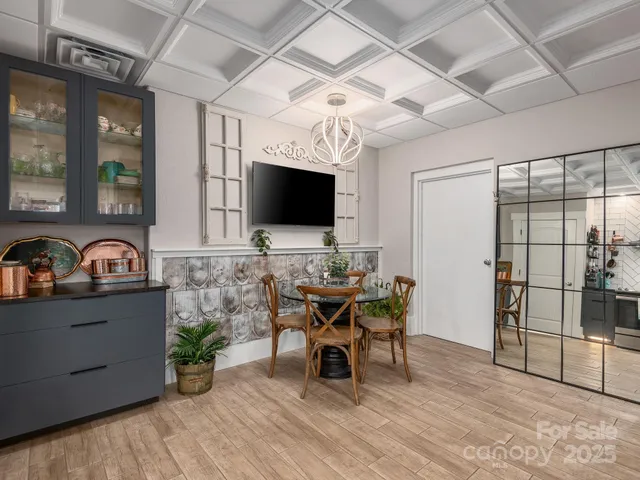 a workspace with furniture and wooden floor