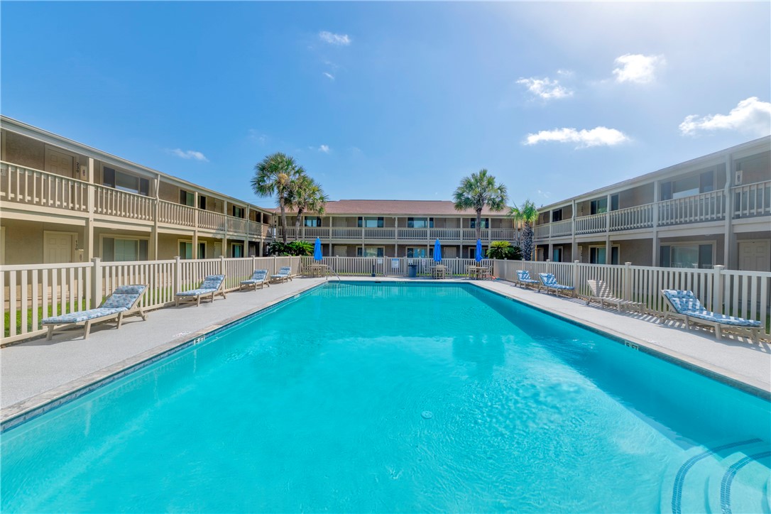 622 Beach Access Road, Unit 229 Port Aransas, TX 78373 - Photo 16 of 24 a view of building with yard