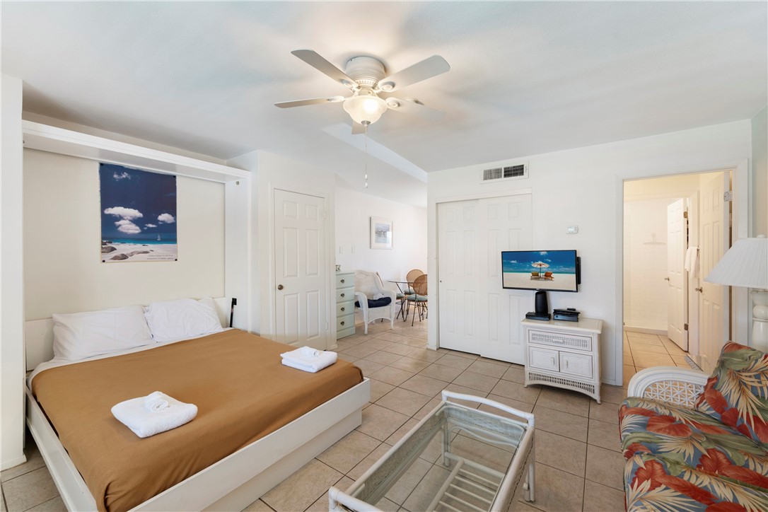 622 Beach Access Road, Unit 229 Port Aransas, TX 78373 - Photo 5 of 24 a living room with furniture and view of kitchen