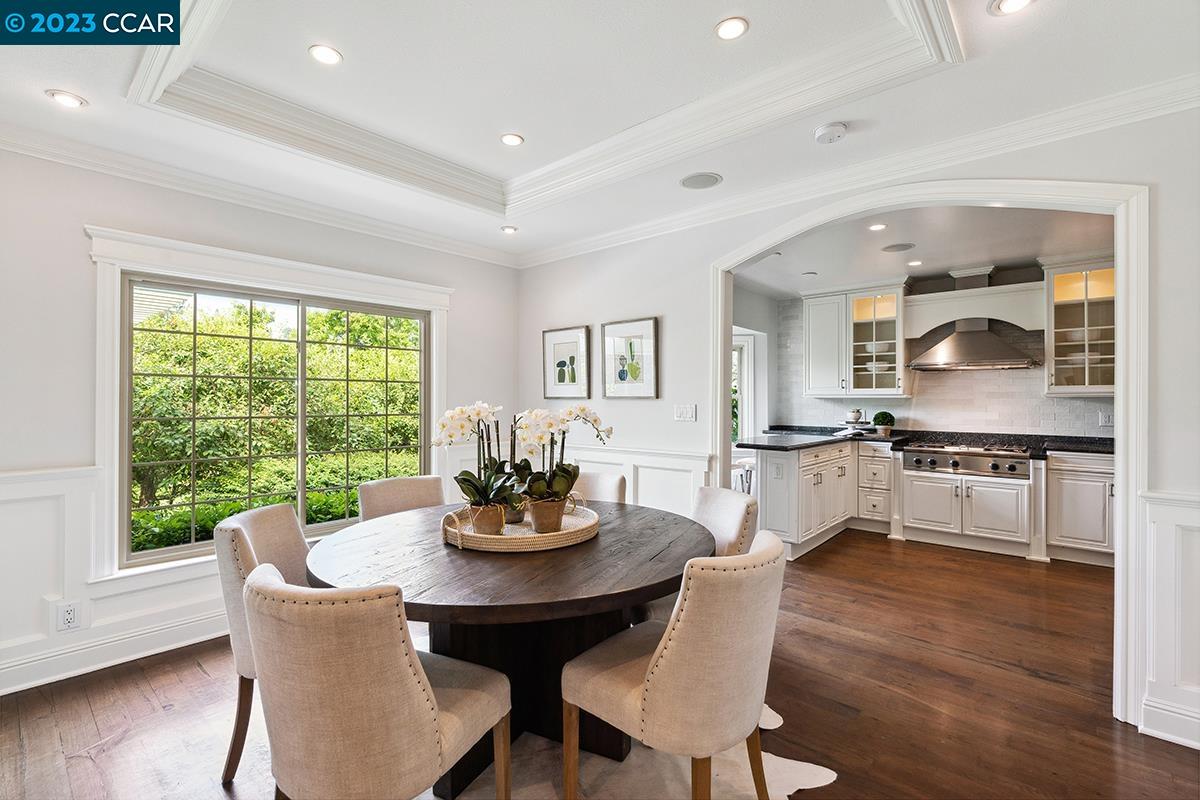 Undisclosed Address Orinda, CA 94563 - Photo 14 of 53 a view of a dining room with furniture a chandelier and wooden floor