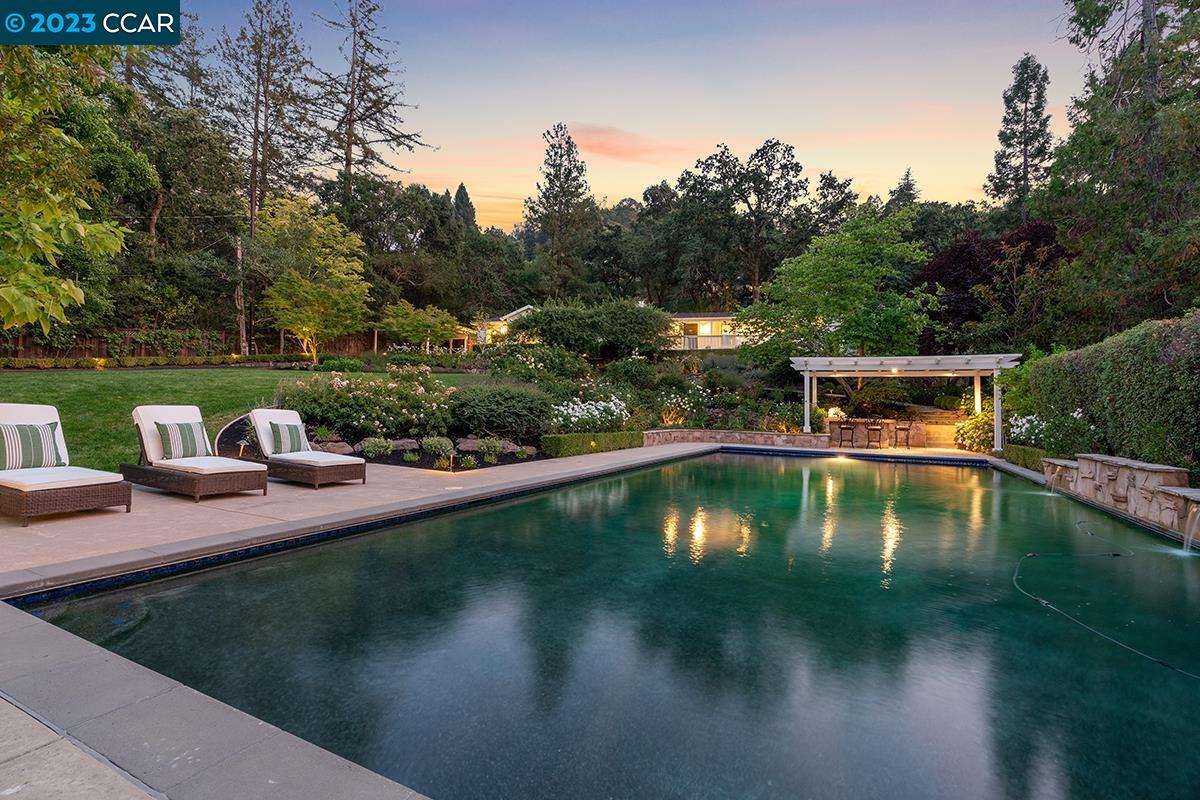 Undisclosed Address Orinda, CA 94563 - Photo 2 of 53 a view of swimming pool with a yard