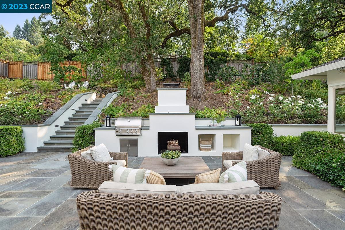 Undisclosed Address Orinda, CA 94563 - Photo 21 of 53 a living room with furniture and a fireplace
