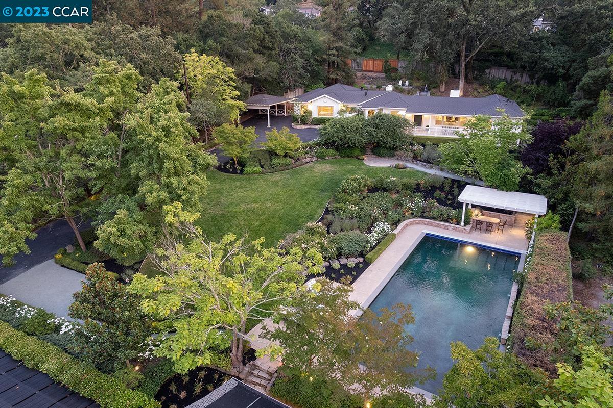 Undisclosed Address Orinda, CA 94563 - Photo 3 of 53 an aerial view of house with yard swimming pool and outdoor seating