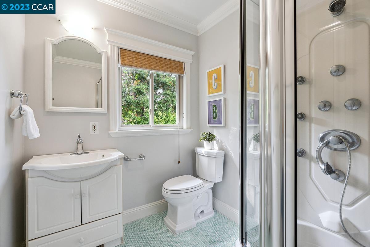 Undisclosed Address Orinda, CA 94563 - Photo 36 of 53 a bathroom with a toilet sink and mirror