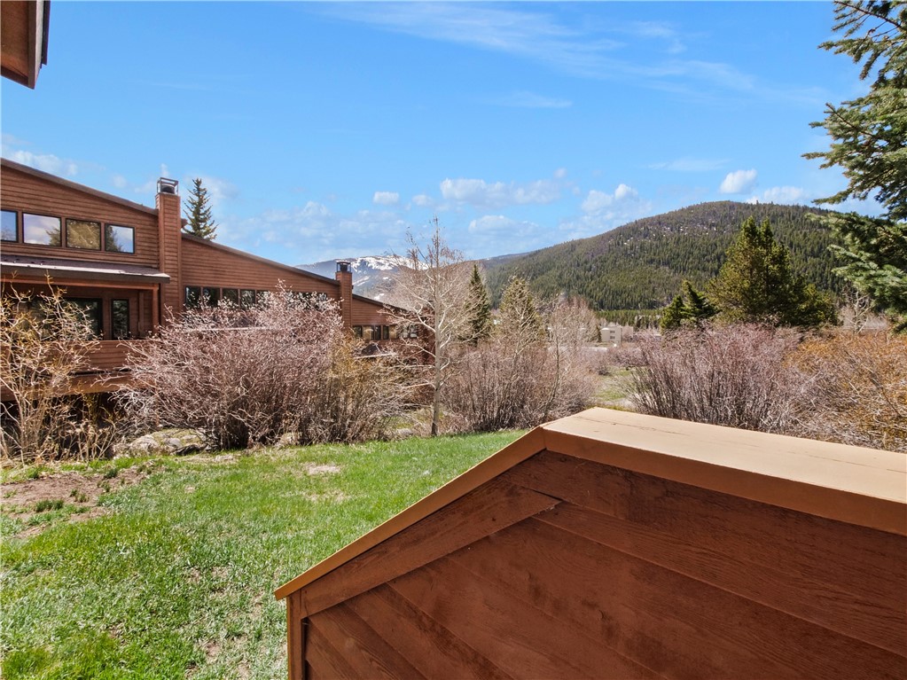 530 Tennis Club Road, Unit 1330 Keystone, CO 80435 - Photo 9 of 35 Stairs Down To Common Lawn & Stream From Back Patio