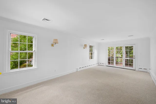 an empty room with windows