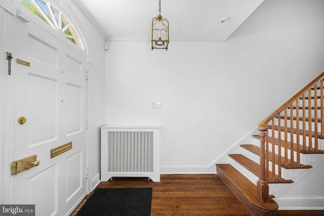 a view of entryway with stairs