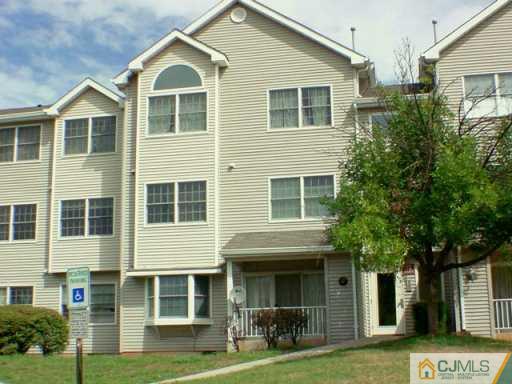 1120 Edpas Road New Brunswick, NJ 08901 - Photo 2 of 2 a front view of a house with a yard
