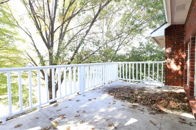 a view of a wooden fence