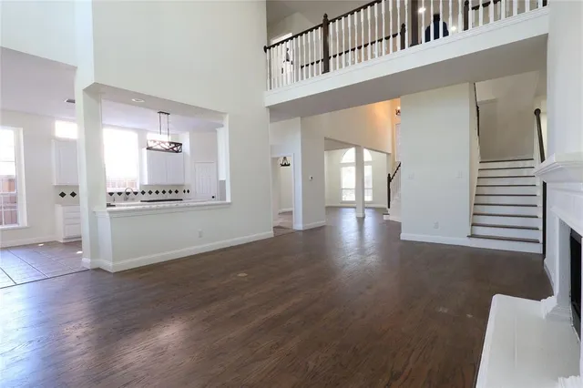 a view of an empty room and glass door