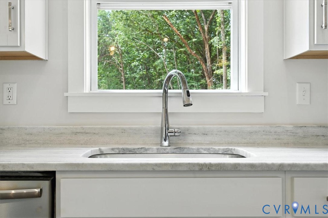 3898 Horseshoe Road Appomattox, VA 24522 - Photo 18 of 32 a kitchen sink with a granite countertop window and sink