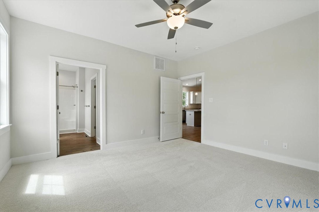3898 Horseshoe Road Appomattox, VA 24522 - Photo 22 of 32 an empty room with closet and mirrors