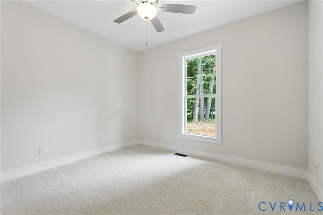 3898 Horseshoe Road Appomattox, VA 24522 - Photo 27 of 32 an empty room with a window