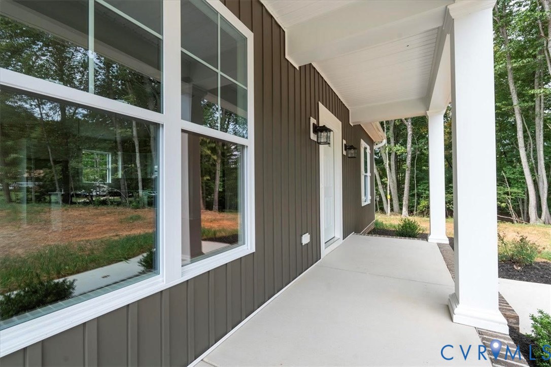 3898 Horseshoe Road Appomattox, VA 24522 - Photo 3 of 32 a view of a house with backyard and porch