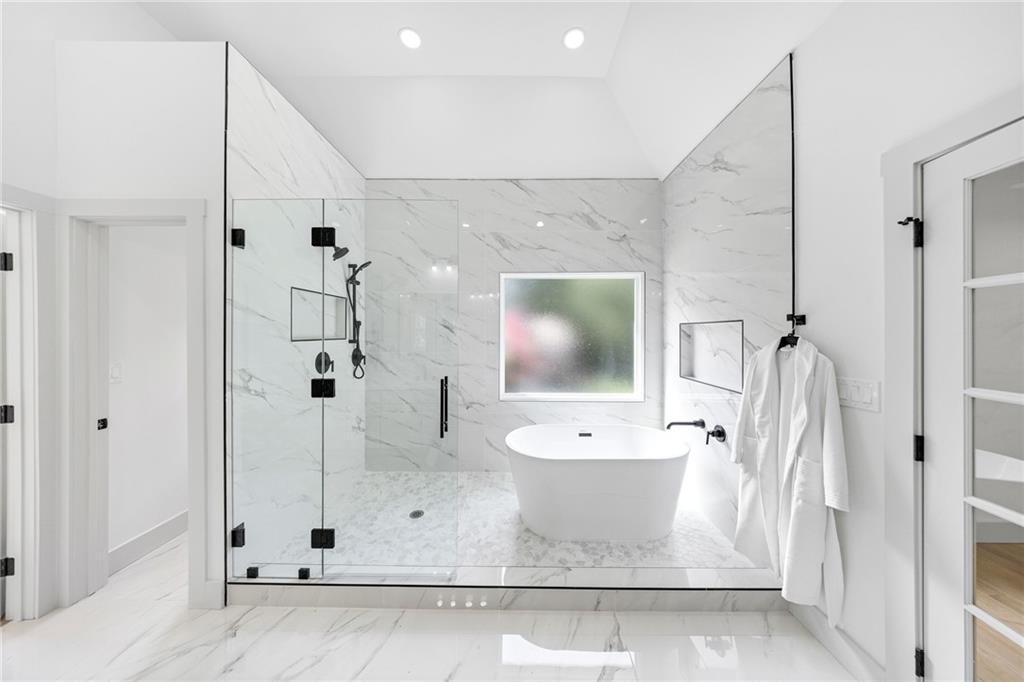 1749 Patriots Way Northwest Kennesaw, GA 30152 - Photo 26 of 54 a bathroom with a shower