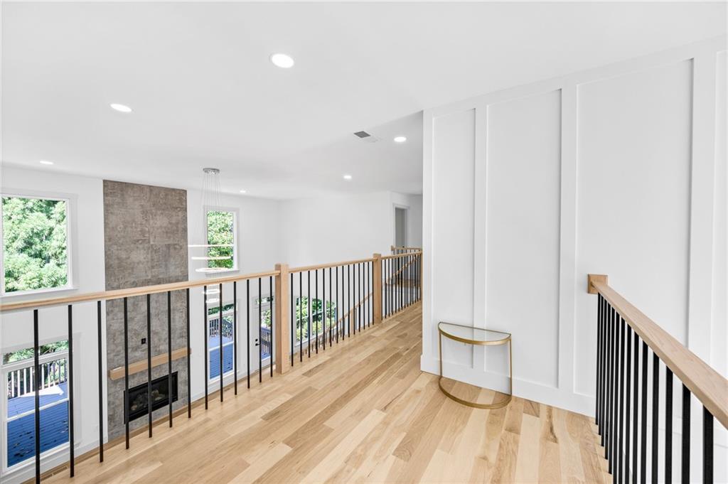1749 Patriots Way Northwest Kennesaw, GA 30152 - Photo 30 of 54 a view of a balcony with wooden floor