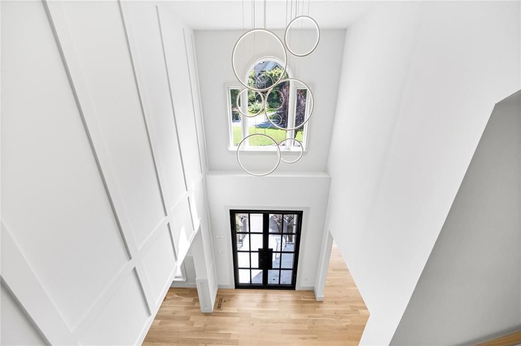 1749 Patriots Way Northwest Kennesaw, GA 30152 - Photo 33 of 54 a view of a hallway with wooden floor and entryway