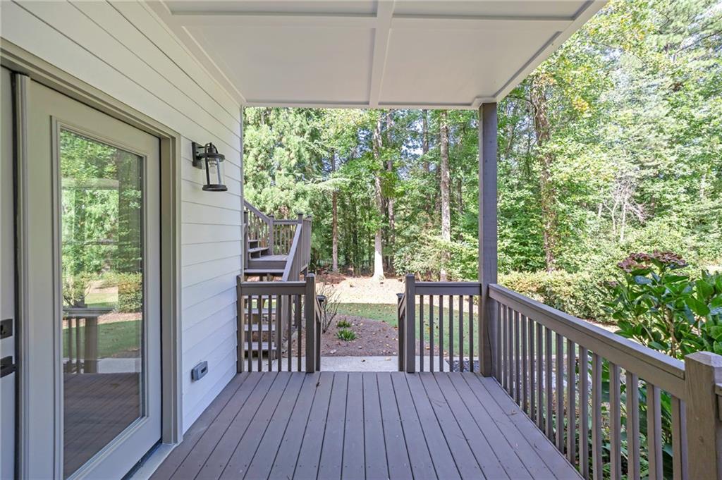 1749 Patriots Way Northwest Kennesaw, GA 30152 - Photo 7 of 54 a view of balcony with wooden floor