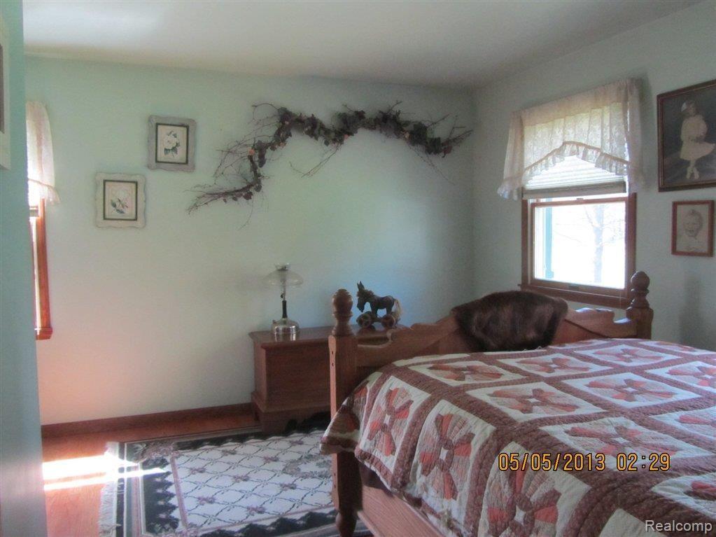 4450 Dutcher Road Howell, MI 48843 - Photo 12 of 25 First floor bedroom .JPG