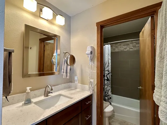 a bathroom with a shower and a bathtub