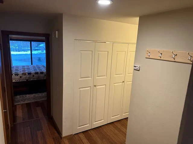 a view of a hallway with washer and dryer