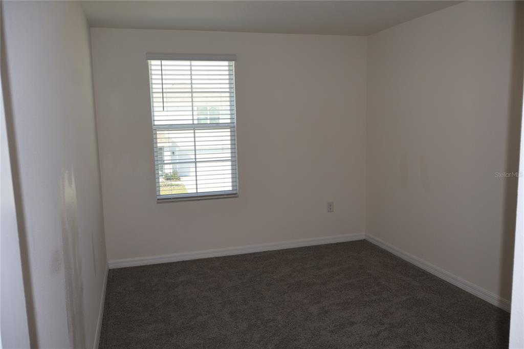 8627 Southwest 45th Court Ocala, FL 34476 - Photo 19 of 39 an empty room with a window
