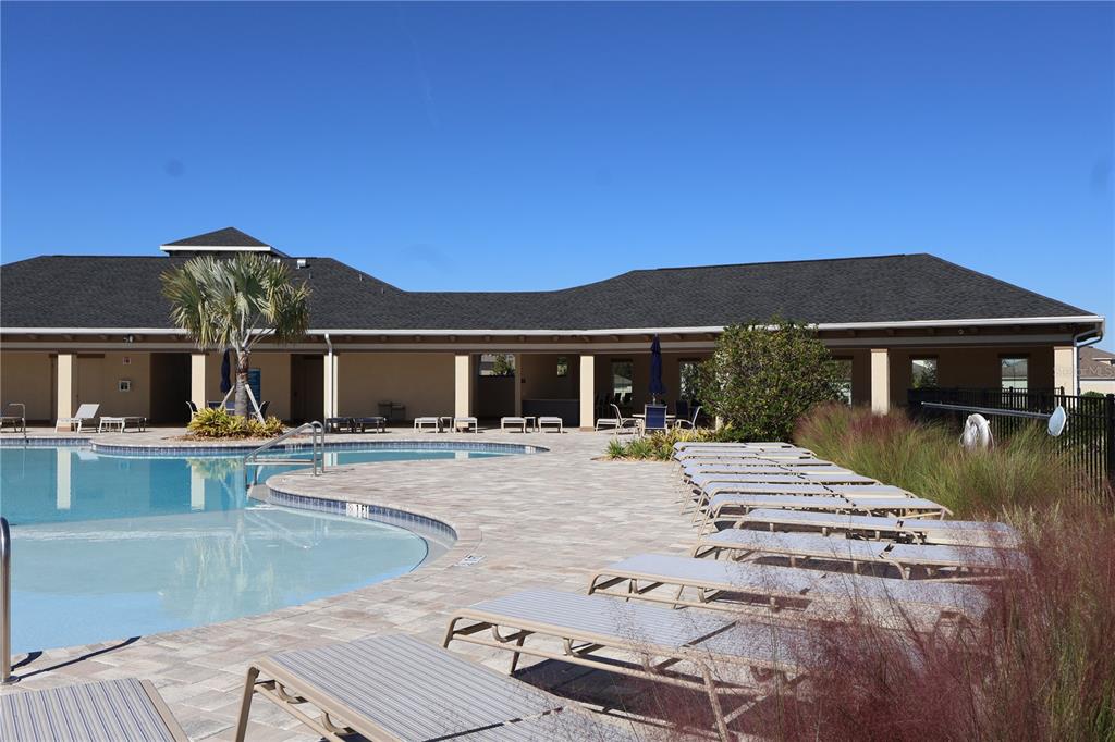 8627 Southwest 45th Court Ocala, FL 34476 - Photo 33 of 39 a view of house with outdoor space and swimming pool