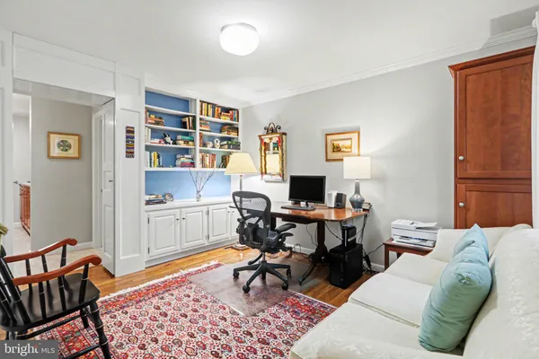 a workspace with furniture and window