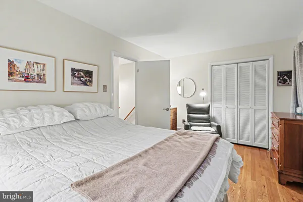 a view of a room with wooden walls