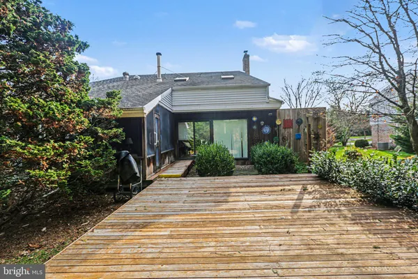 a view of a backyard of the house