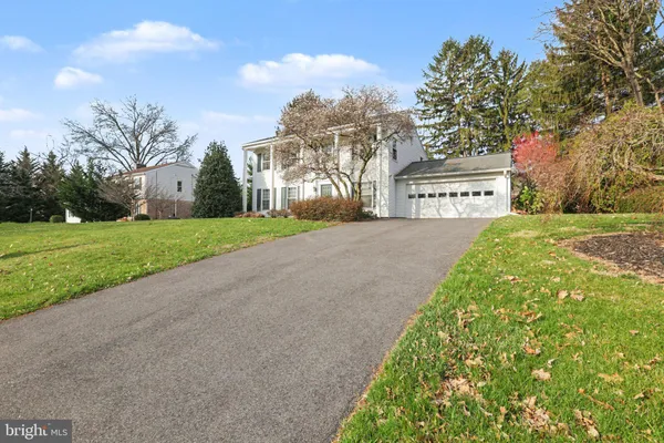 a view of a backyard of the house